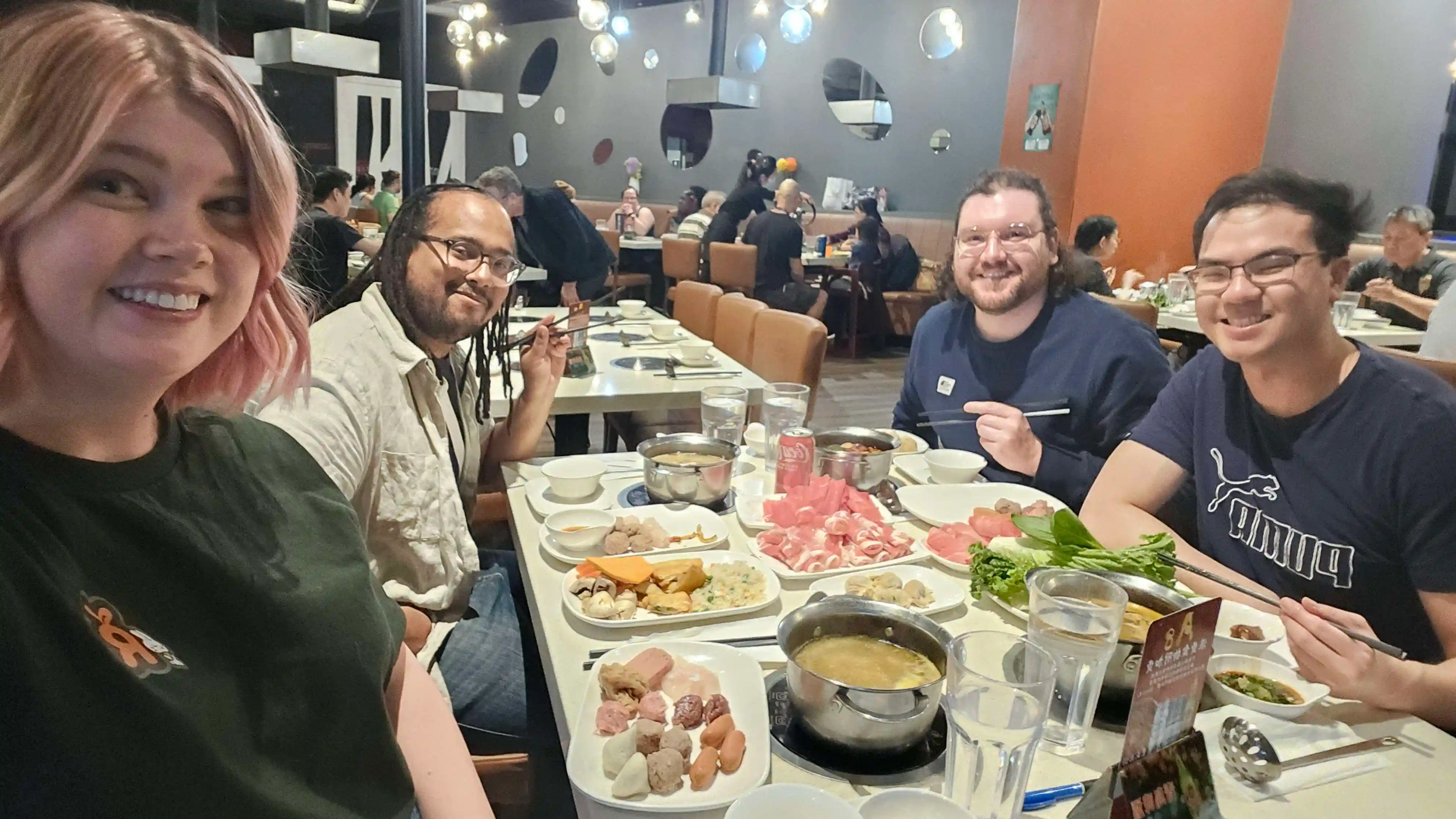 Photo of the Caldera Interactive team eating dinner together